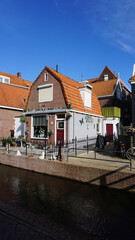 Beautiful wooden houses. Typical small Dutch houses facades in Volendam, Netherlands