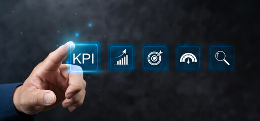KPI Business analytics. Business strategy and business intelligence. Businessman touching KPI icon.