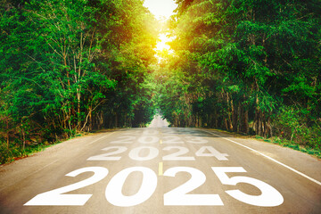 Numbers 2025 and start on asphalt road highway with sunrise or sunset sky background.