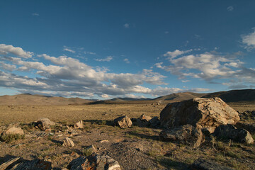 Huge stones among the steppe plain