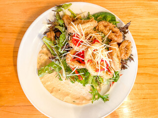 Savoring Seafood: Calamari and Salad Delight