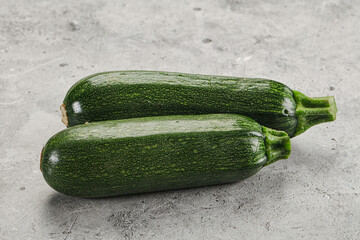 Raw green ripe zucchini vegetable