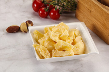 Crushed parmesan cheese in the bowl