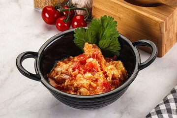 Shakshuka with tomato for breakfast