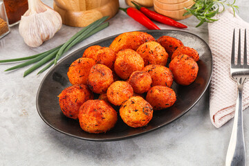 Baked young potato with paprika