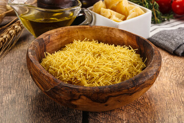 Raw dry Italian pasta Vermicelli