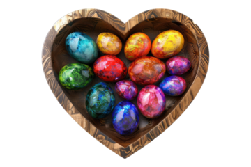 Colored eggs in heart shape wooden bowl isolated on transparent background