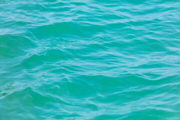 Turquoise water in the sea as an abstract background. Texture