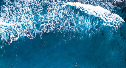 Aerial view of rough ocean with waves. Popular surfer's beach Praia da Alagoa Porto da Cruz,...