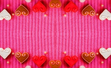 Abstract Creative background for Valentine's day. Red Hearts on a Pink Background. Symmetrical...