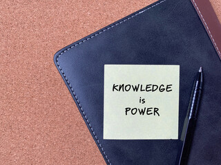 Knowledge is power on paper background. Inspirational motivational quote.
