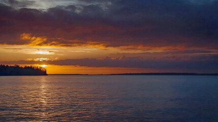Beautiful Golden Hour Sunset with Cloudy Sky Over Calm Lake