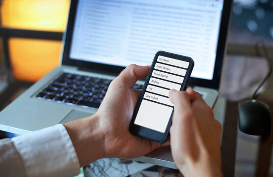 Filling form online to register personal data information about name, address, email, city and date of birth of user.
