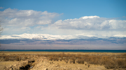 the spring foothills of the snowy mountains