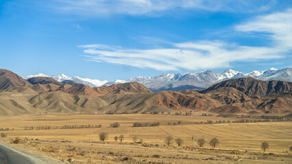 the spring foothills of the snowy mountains
