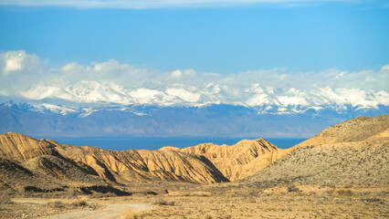 the spring foothills of the snowy mountains