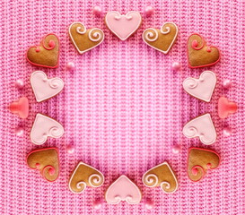 Fototapeta na wymiar Mother day frame with Copy space. Cute gingerbread cookies on a pink background. View from above