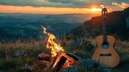 Romantic atmosphere in the mountains around a campfire with a guitar at sunset