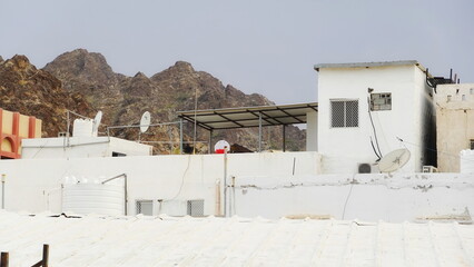 Rooftop View Against Mountain Background Daytime Color