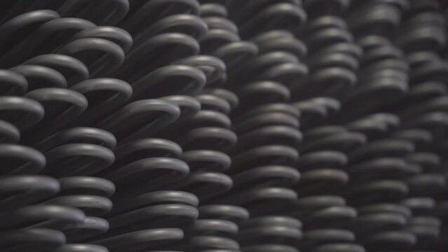 Stacked steel tubes of the heat exchanger. Mass factory production. Heating element.