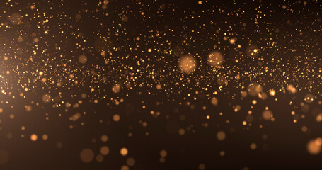 Abstract background of gold particles. Gold shiny background. gold dust and beautiful bokeh on a dark background..