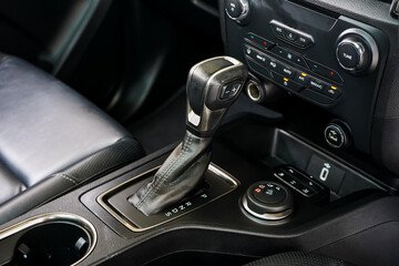 automatic transmission shift selector in the car interior. Closeup a manual shift of modern car...