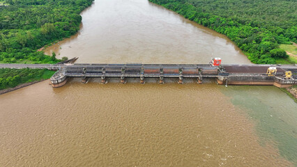 Majestic dam, formidable gates, taming a turbulent river. Its sheer scale and precision engineering...