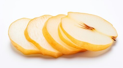 sliced pear with vibrant yellow skin and juicy white flesh on white background