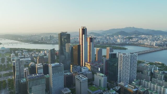 Drone View of Seoul city in South Korea, Sunset in Yeouido Financial District, Spring