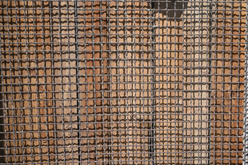 metal protective barrier on wooden background