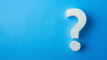 White question mark on blue background with copy space. Issue solving concept