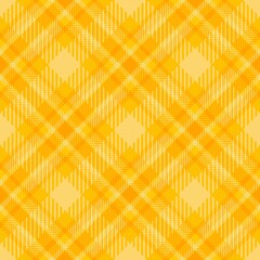 Tartan seamless pattern, yellow and orange, can be used in fashion design. Bedding, curtains, tablecloths
