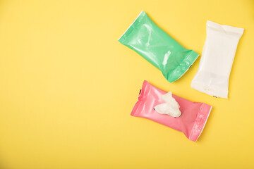 Packaging of wet wipes on background. An open pack of hand and body wipes. Mockup. A clean packet...