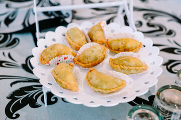 Several cookies prepared for the visitors, neatly arranged on a plate, tempting with their delightful aroma and inviting presentation.