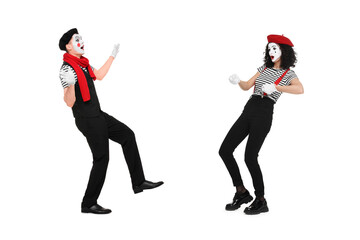 Obraz premium Two funny mimes performing on white background