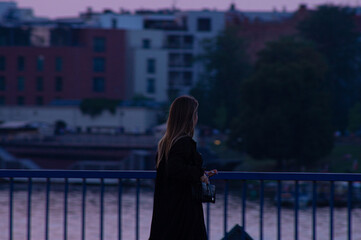 woman walking on the street © Emilia