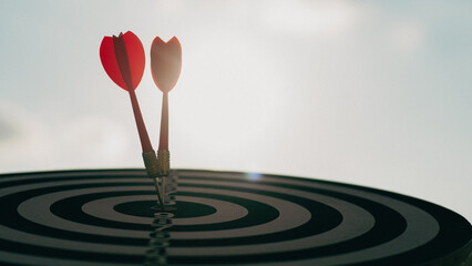 business targeting and winning goals business concepts. dart arrow hitting in the target center of...
