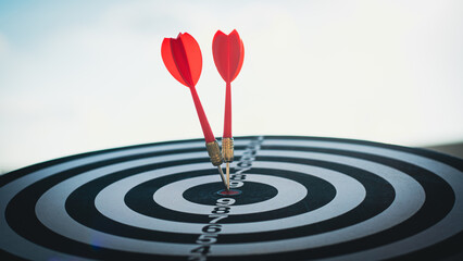 Fototapeta na wymiar business targeting and winning goals business concepts. dart arrow hitting in the target center of dartboard. Profit and business growth. Strategy concept.