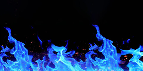 Obraz premium Texture of blue fire on black background, Flame, blue fire with smoke on dark background. black walls and smoke. Abstract dark glitter fire particles lights. fire in motion blur. 