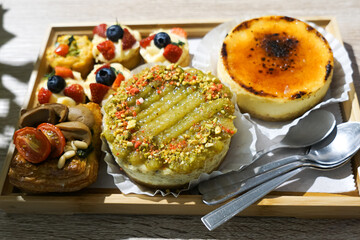 Varieties of cake and pastry in a tray