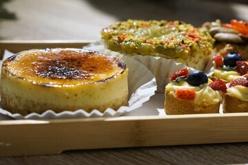 Varieties of cake and pastry in a tray