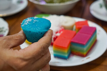 Malaysian cakes or kuih-muih on selective focus and blurry.