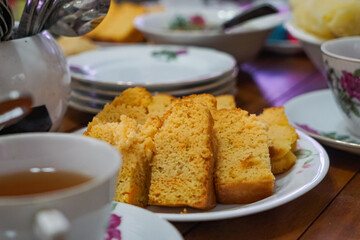 Kek mentega is a Malaysian butter cake, moist and dense, with a rich buttery flavor. It is a beloved treat often served during celebrations and gatherings. 
