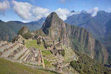 Wide view of Machu Picchu an ancient citadel in the clouds Peru