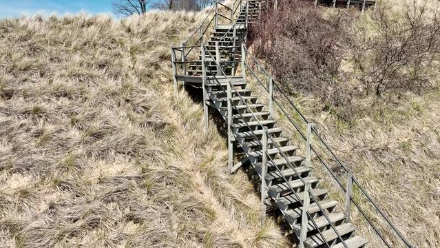 Descending near the older section of timber stairs.