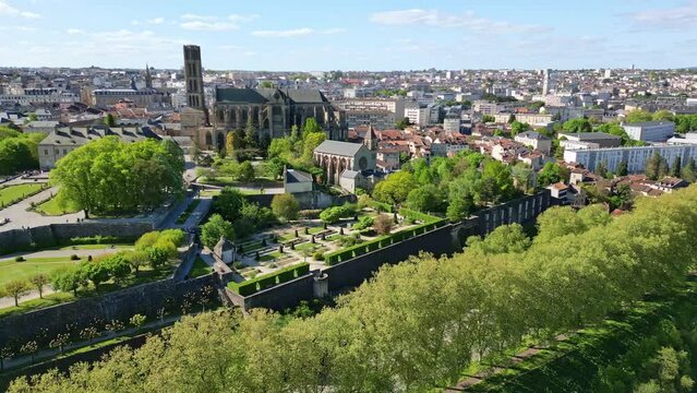 Cathedral of Saint-Etienne and Pont Neuf bridge on Vienne river, Limoges, France. Aerial orbiting and cityscape