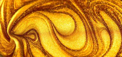 Beautiful abstract golden liquid paint background, beauty gold backdrop texture. Metallic gold...