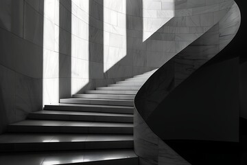 The abstract interplay of light and shadow on a curved staircase