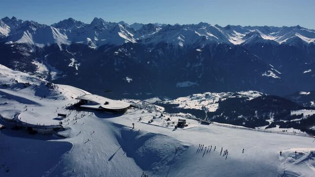 Panoramarestaurant BergDiamant on top of white mountain ridge in Alps
