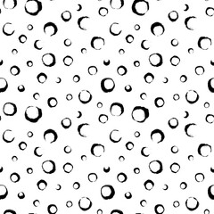 Vector dot pattern. Seamless background from brush strokes. Dotted ornament